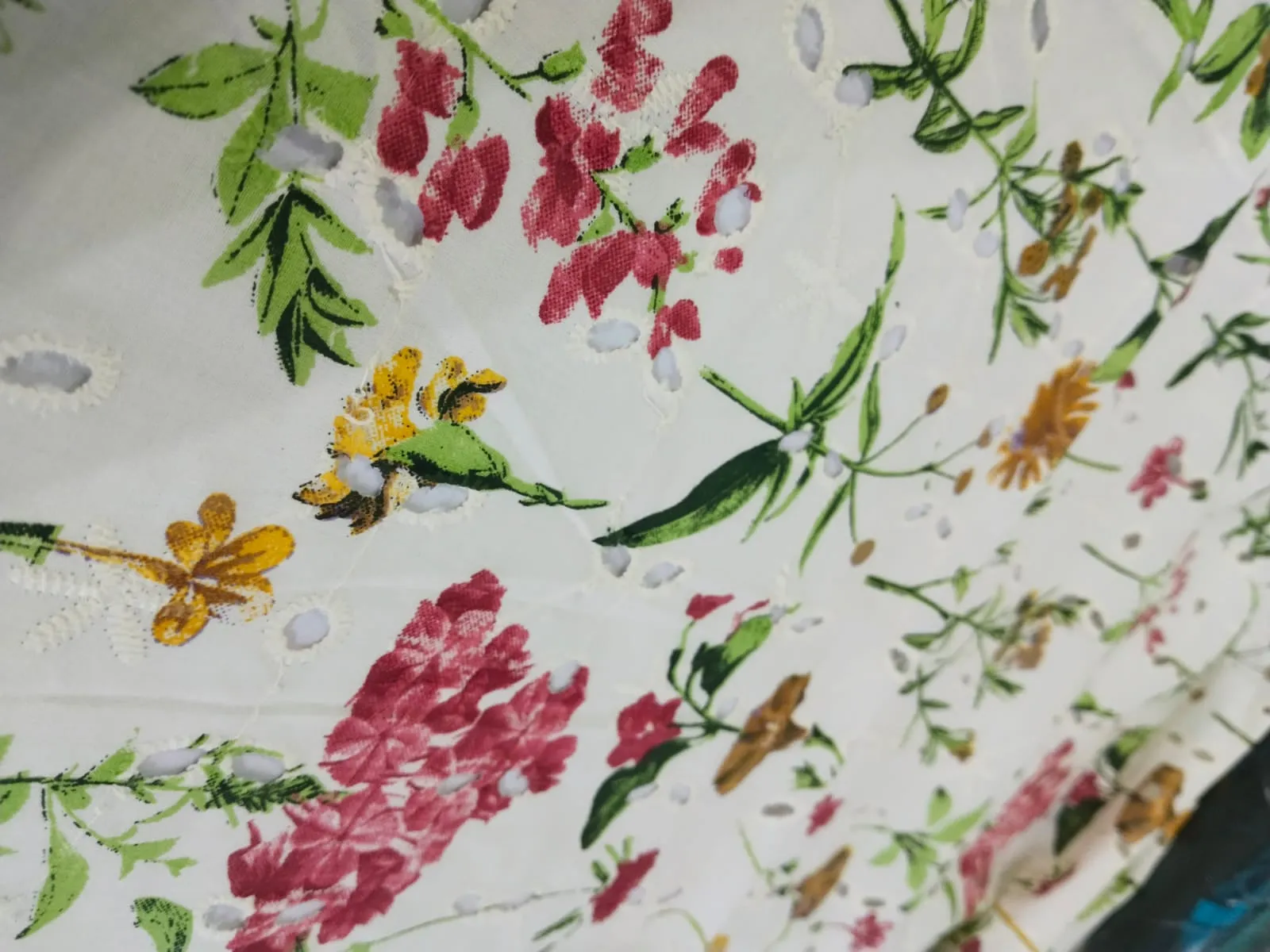 100% Cotton printed and chikan embroidery  fabric  58 inches wide 147 cms. available in 2 colors purple floral/red floral