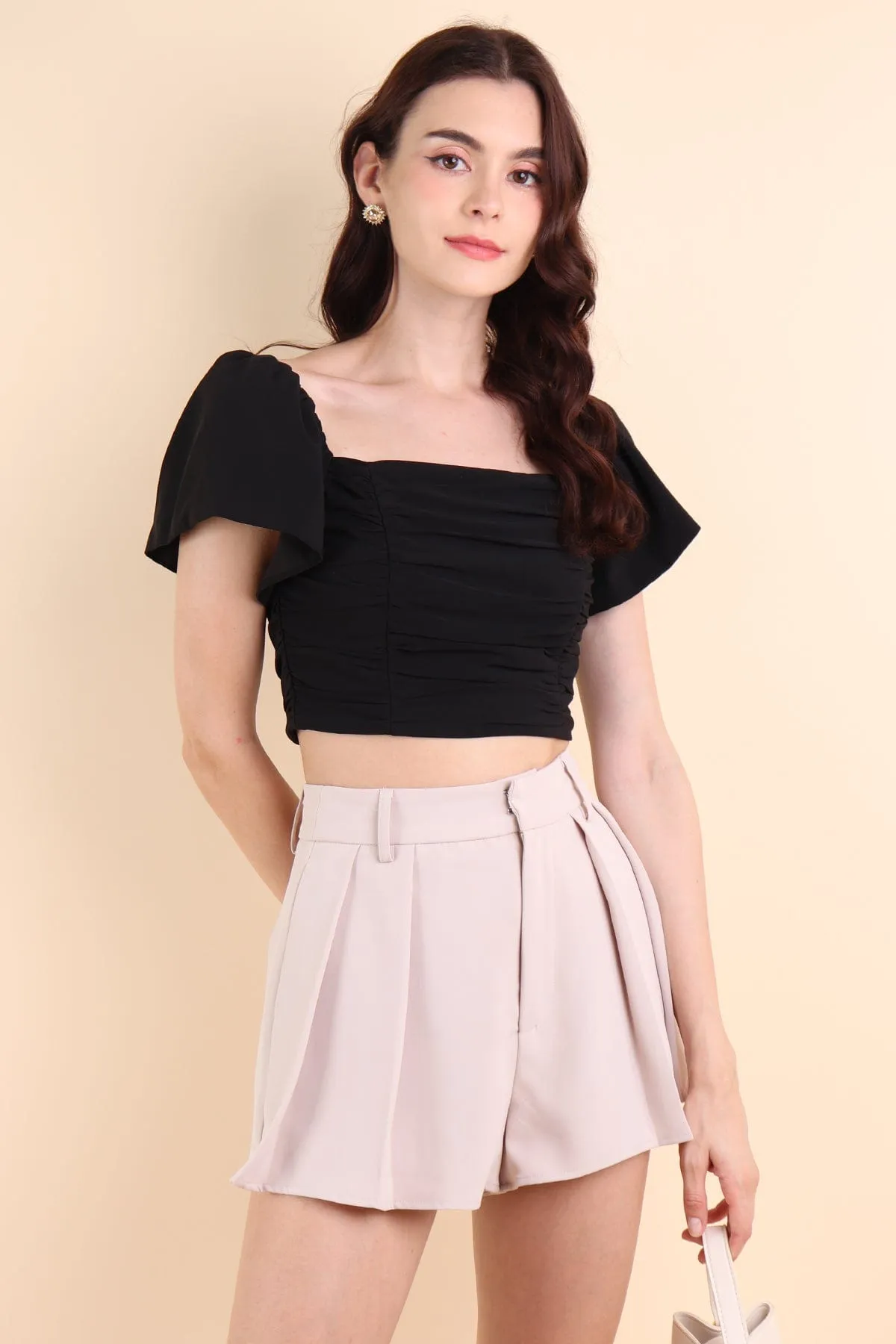 LUCERNE PLEATED SHORTS IN ECRU